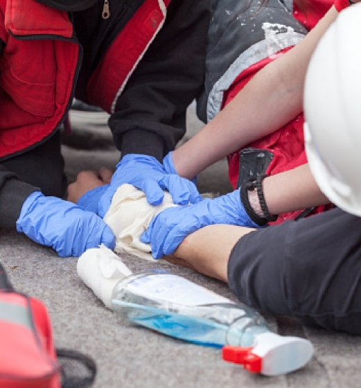 Paramedics assisting injured person